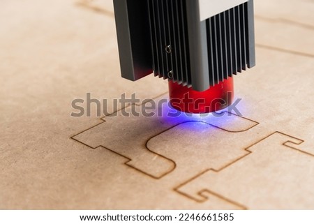 machine cutting wood by means of laser beam Foto stock © 