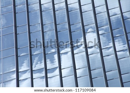 Reflection of the sky in a sky scraper