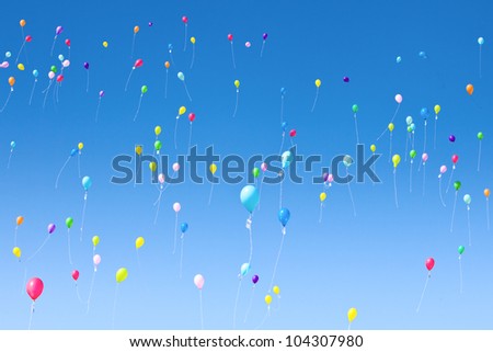 Colorful balloons that fly in the sky.