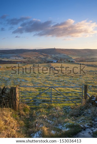 farm gate and fields in yorkshire in winter