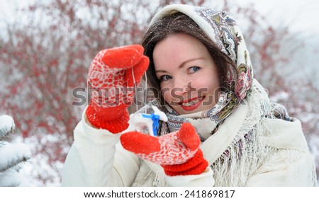 Young Russian woman in winter park
