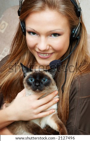 pretty customer support girl have break and relaxing with her lovely cat ;-)