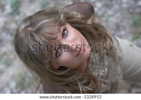 young cute blond woman. shooting from upside. selective focus.