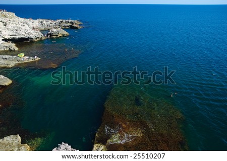deep blue see and diving cliffs