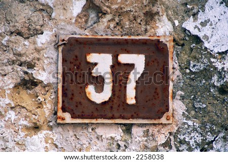 Old home number, 37, at the wall
