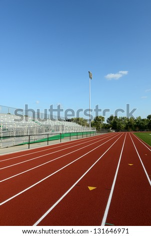 Track Field on a sunny day and blue sky on a vertical format