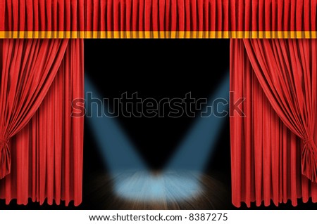 Large red curtain stage opening with spot lights and dark background