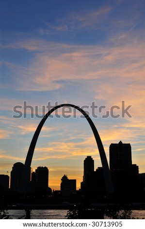 Saint Louis skyline during after sunset showing the arch on a vertical format