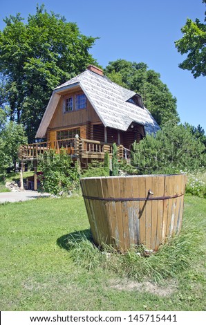 summer sea resort villa house and wooden bath tank