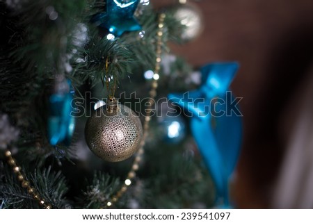 Beautiful blue glass bowl on New Year tree, holiday, new year