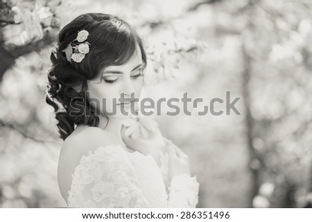 Portrait of a beautiful bride, vintage image, black and white photo, closeup