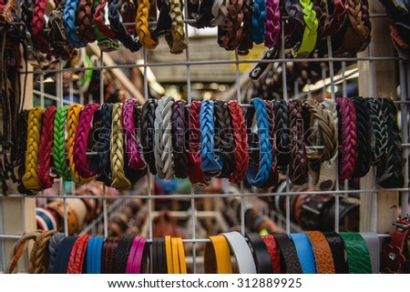 A variety of products for tourists on the market in Bangkok, Thailand, leather Bracelets