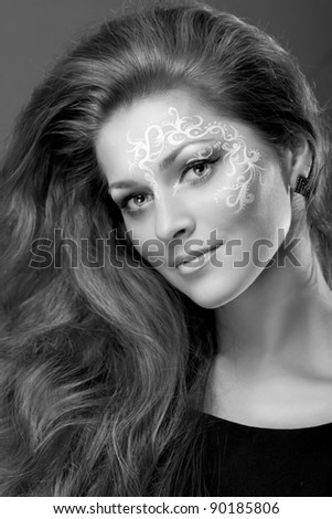 Closeup black-and-white portrait of girl with a pattern on face, European, White, Caucasian