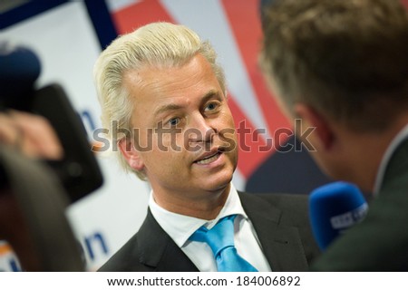 ENSCHEDE, NETHERLANDS - SEP 05: Political leader Geert Wilders of the Dutch center right party PVV is giving a radio interview during campaigning, SEPTEMBER 05, 2012 in the Netherlands