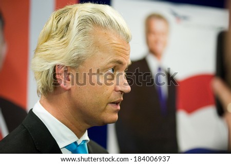 ENSCHEDE, NETHERLANDS - SEP 05: Political leader Geert Wilders of the Dutch center right party PVV is listening during a radio interview, SEPTEMBER 05, 2012 in the Netherlands