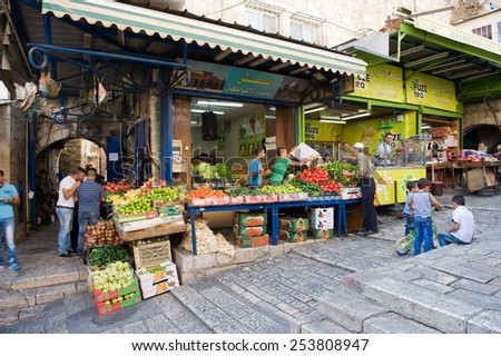 JERUSALEM, ISRAEL - OCT 08, 2014: Fruit  shop in the small streets of the muslim quarter near Damascus gate in the old city of Jerusalem