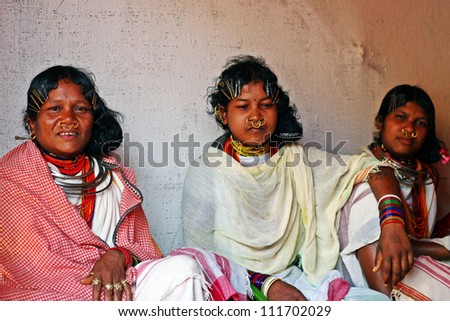 ORISSA, INDIA - JANUARY 30: A group of tribal women in traditional attire attend the state Tribal fair on January 30, 2011 at Orissa, India. The fair is organized every year for tribal welfare.
