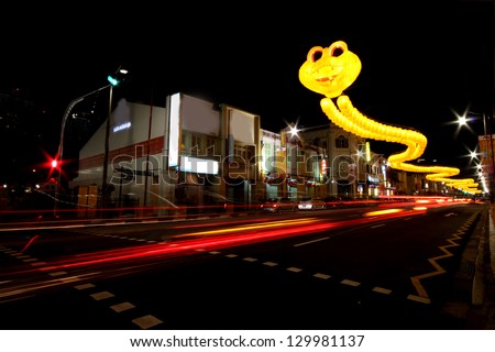 CHINA TOWN, SINGAPORE - FEBRUARY 08: Streets have been decorated with snake lanterns for Chinese New year on February 08, 2013 in China Town, Singapore