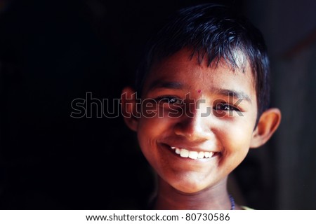 INDIA - JAN 01: A 10 years-old-girl, Juliya Sahoo, smiles during a \'help the kids\' drive, organized by software professionals on January 01, 2011 at India. Sahoo lives in an orphanage.