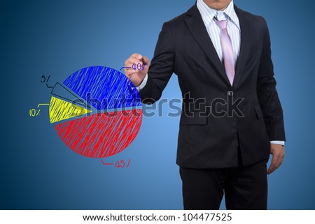 Male hand drawing a chart.