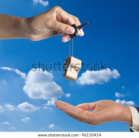 Car-key exchange with blue sky background.