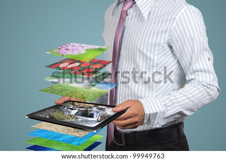 Display on tablet in the hands businessman.