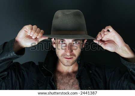 Mystery man with hat portrait