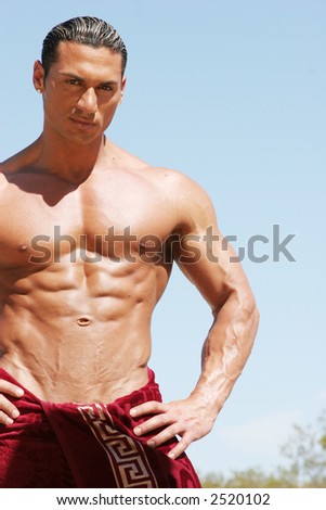 Muscular man with red towel