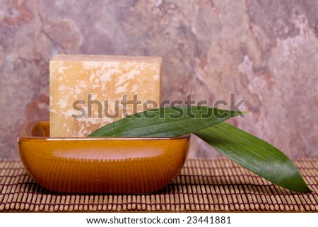 Bath soap and a bamboo leaves