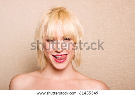 Beautiful Woman Sticking Her Tongue Out After Drinking Milk Stock Photo ...