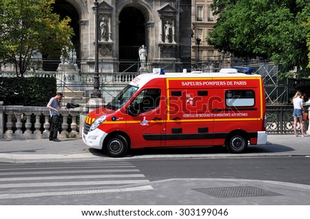 PARIS, FRANCE - JULY 2:  Fire car on the street of Paris downtown on July 2, 2015. The Paris Fire Brigade , is a French Army unit which serves as the fire service for Paris.