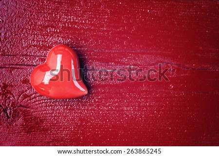 red wood background with hearts - your text here