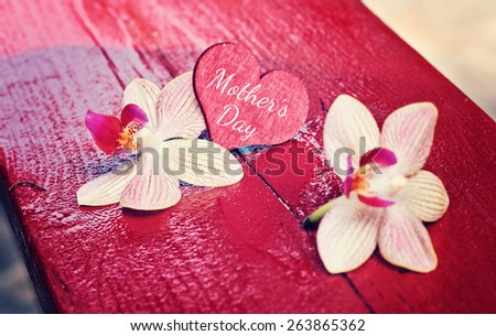 red wood background with hearts - mothers day