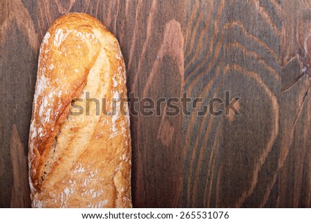 food background - baguette bread on wood table