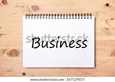 writing pad on wood table  - business