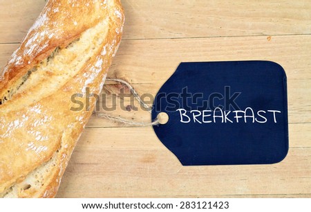 food background - baguette bread on wood table - breakfast