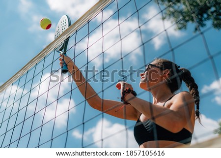 Beach Tennis Player at the Net