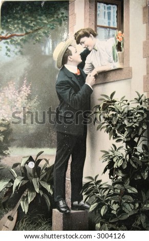 Victorian romance - secret love  - circa 1909  hand-tinted photograph