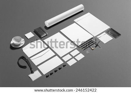 Blank stationery branding set isolated on grey. Consist of folder, note, business cards, pencil, dvd disk, money clips, envelopes, tubus.
