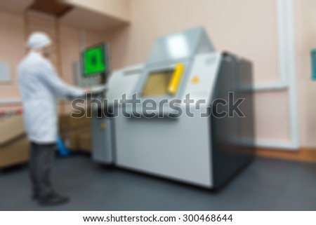 Production of electronic components  at high-tech factory blur background with bokeh