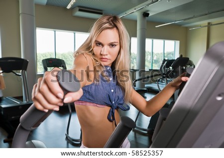Beautiful blond girl at the health club