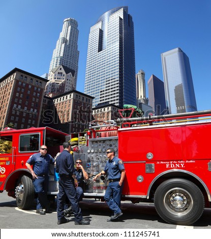 LOS ANGELES, CALIFORNIA, USA - JUNE 10, 2012: Unidentified Los Angeles firefighters wait for a new assignment in LA downtown on June 10, 2012 in Los Angeles, California