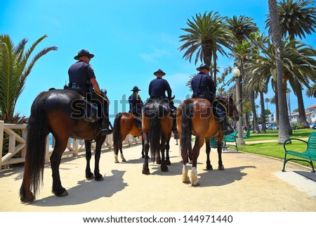 SANTA MONICA, CALIFORNIA, USA - JULY 4, 2013: Santa Monica Police Department patrols Santa Monica recreational park providing security on Independence Day on July 4, 2013 in Santa Monica, California.