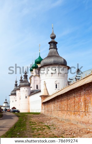 old russian church with wooden domes over sky
