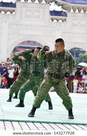 TAIPEI, TAIWAN-JUNE 16,2013:Taiwan\'s principal special operations force display in Discovery Channel program at CKS memorial Hall on JUNE 16,2013 in Taipei,Taiwan