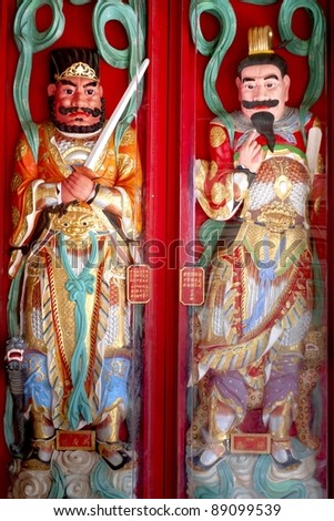 ancient chinese door god in a temple