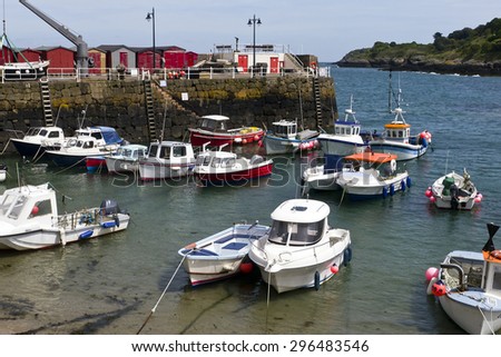 Picturesque bay with fishing boats; beautiful coastal inlet with fishing and leisure vessels