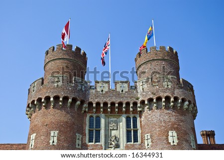 15th century English castle flying flags of Canada and the United Kingdom (union flag)