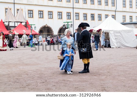 Mother and daughter in costumes of the 18th century city dwellers; Baroque Festiva, Schloss Friedenstein, Gotha, Germany, August 29, 2015