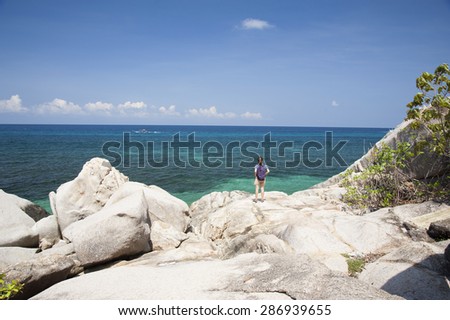 A Girl Stand Alone on the Rock